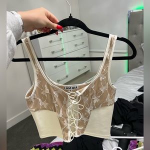 I am Gia white lace top never worn